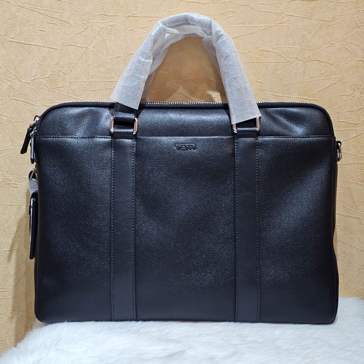 Tumi