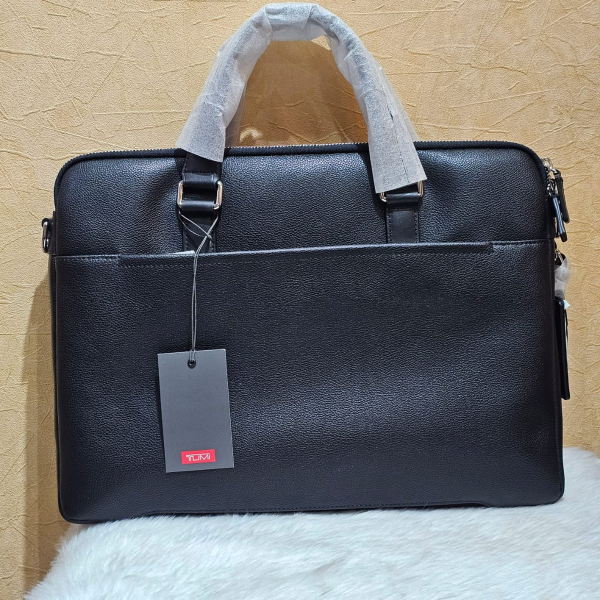 Tumi