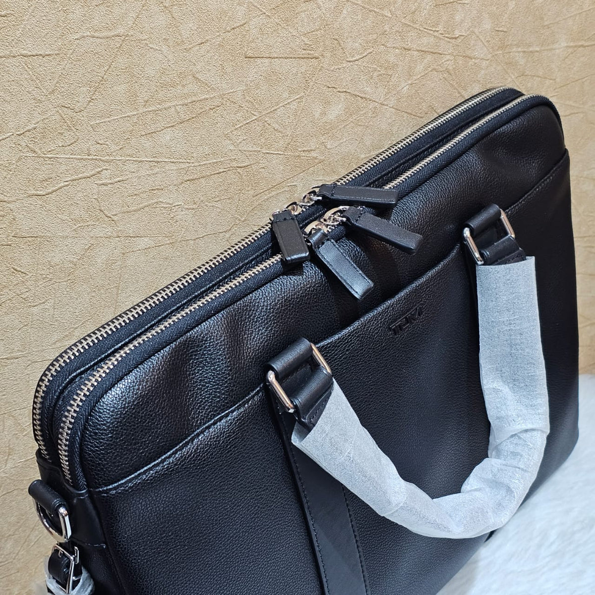 Tumi