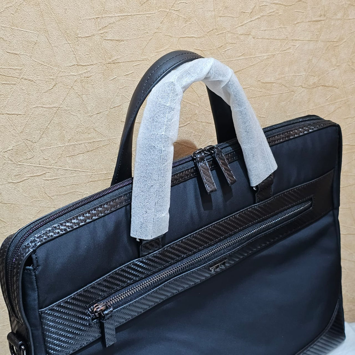 Tumi